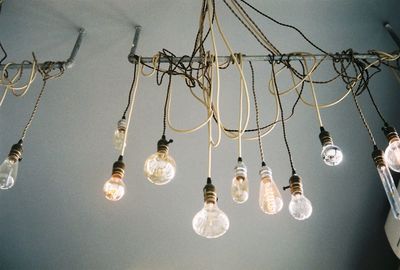 Low angle view of illuminated chandelier