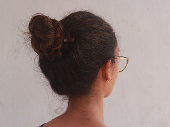 Brunette woman from the back showing her hair