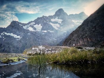 Scenic view of snowcapped mountains against sky