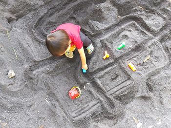 Playing sand and make road with imagination