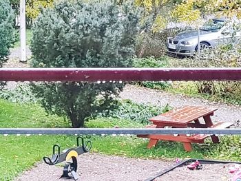 Empty bench in park