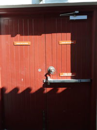 View of red closed door of building