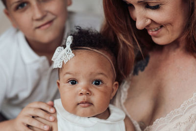 Portrait of mother with baby