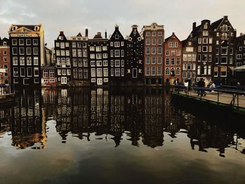 Reflection of buildings in lake