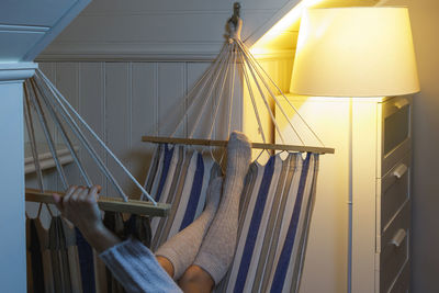 Low angle view of clothes hanging on ceiling