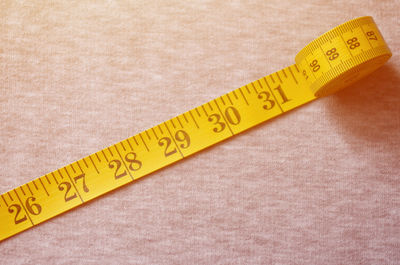 Close-up of tape on table