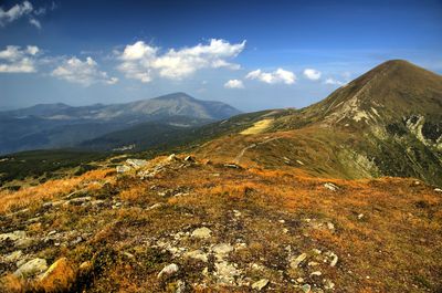 Scenic view of mountains against sky