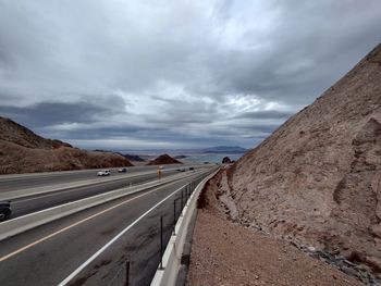 Empty road against sky