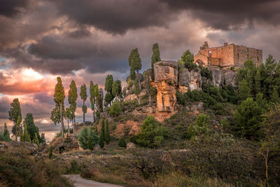 Panoramic view of old building against cloudy sky