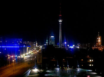 Illuminated cityscape at night