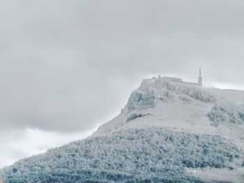 Scenic view of mountains against sky during winter