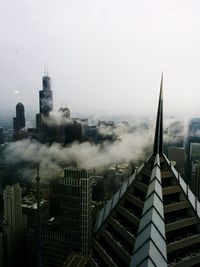 Aerial view of cityscape against clear sky