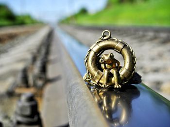 Close-up of cross on railroad track