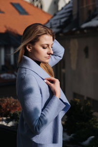 Young woman standing in city