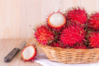 High angle view of fruits in basket on table at home