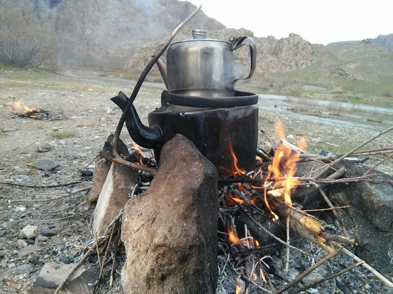 obsolete, heat - temperature, rusty, metal, abandoned, damaged, deterioration, burning, flame, run-down, old, wood - material, fire - natural phenomenon, outdoors, day, close-up, no people, firewood, container, destruction