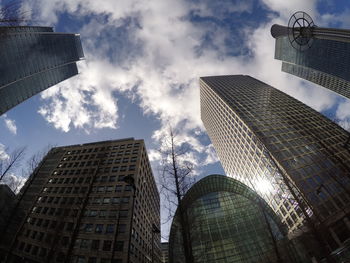 Low angle view of modern buildings against sky