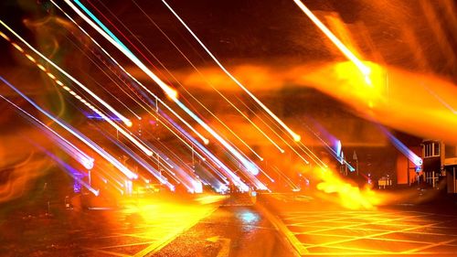 Light trails on city street at night