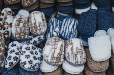 Full frame shot of slippers for sale in market