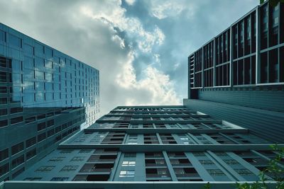 Low angle view of office building against sky