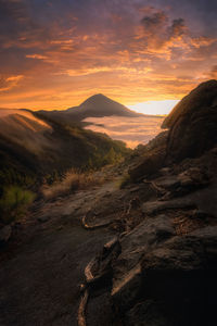 Scenic view of landscape against sky during sunset