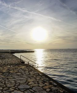 Scenic view of sea at sunset