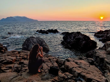 Scenic view of sea against sky during sunset