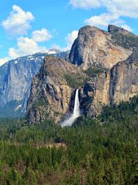 Scenic view of yosemite waterfall against sky