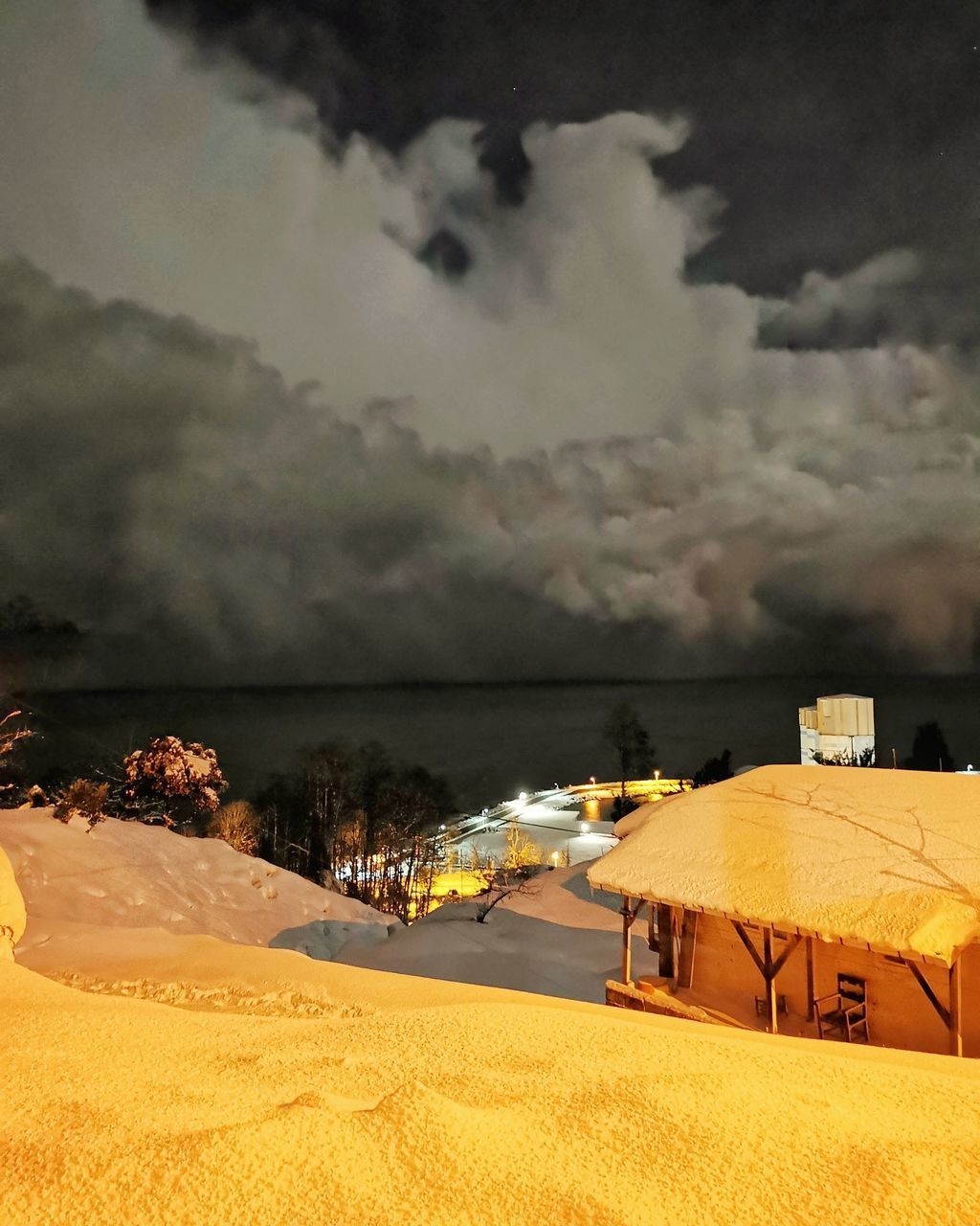 SCENIC VIEW OF BEACH AGAINST SKY DURING SUNSET