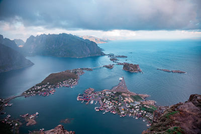 High angle view on mountains among the sea against sky, lofoten, norway