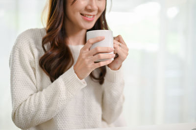 Young woman using mobile phone