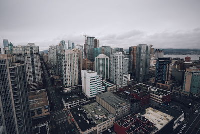 High angle view of buildings against sky in city