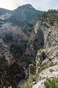 Scenic view of rocky mountains against sky