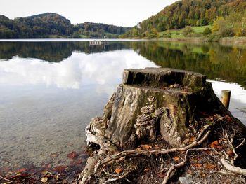 Reflection of clouds in calm lake