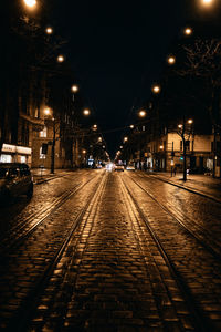Illuminated street lights at night
