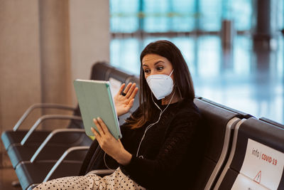 Young woman using mobile phone