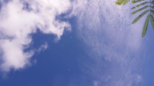 Low angle view of clouds in blue sky