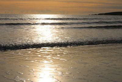 Scenic view of sea at sunset