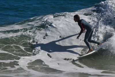 Man surfing in sea