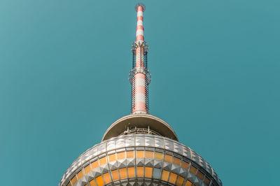 Low angle view of tower against clear blue sky