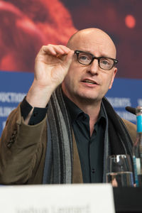 Close-up portrait of man wearing eyeglasses