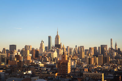 View of cityscape against clear sky