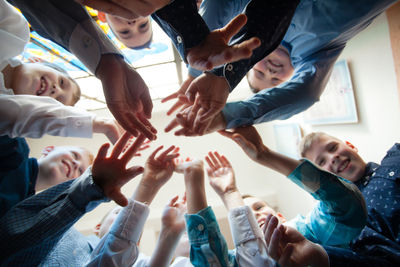 High angle view of people in hands