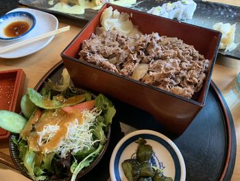 High angle view of food served on table