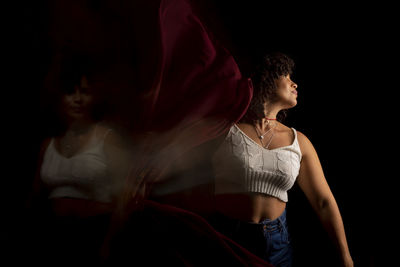 Time lapse view of woman moving a rag. long exposure, motion blur. 