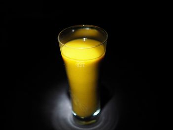 Close-up of drink against black background