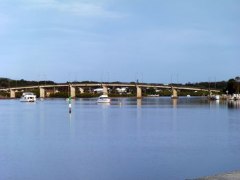 Bridge over river against sky