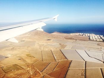 Scenic view of sea against blue sky