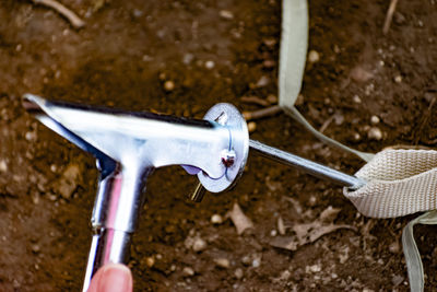High angle view of bicycle wheel against wall
