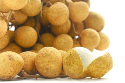 Close-up of longan against white background